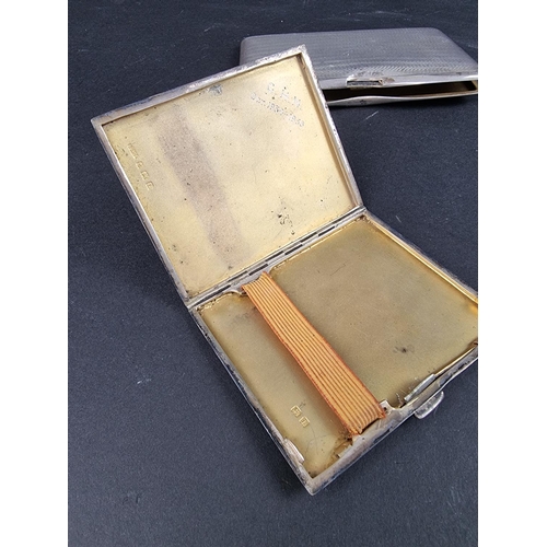 803 - A silver cigarette case, by Turner & Simpson, Birmingham 1927, 13cm long; together with two othe... 