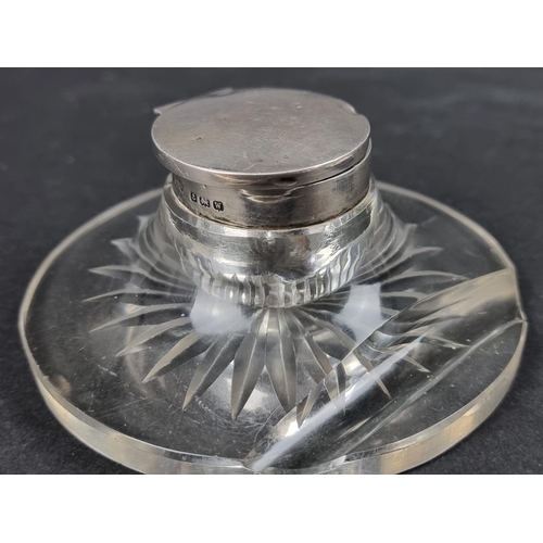 809 - A silver mounted cut glass inkwell, by Henry Clifford Davis, Birmingham 1921; together with a silver... 