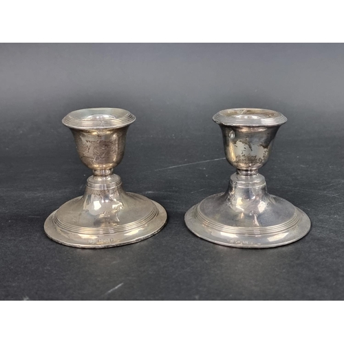 815 - A pair of Edwardian silver squat candlesticks, by W J Myatt & Co, Birmingham 1908, 7.5cm high, w... 