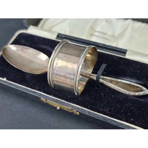 821 - A cased silver Christening set, by William Suckling Ltd, Birmingham 1926; together with a silver rat... 