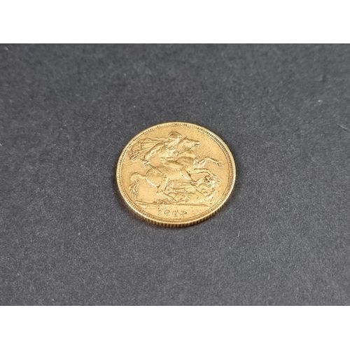 840 - Coins: an Edward VII 1903 gold sovereign.