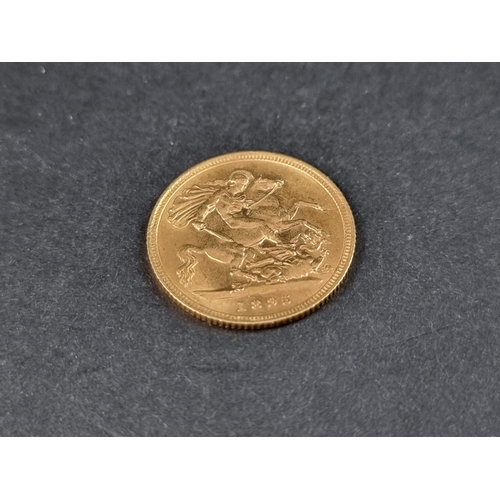 845 - Coins: a Victoria 1895 gold half sovereign.