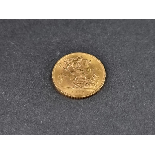 848 - Coins: a George V 1912 gold half sovereign.