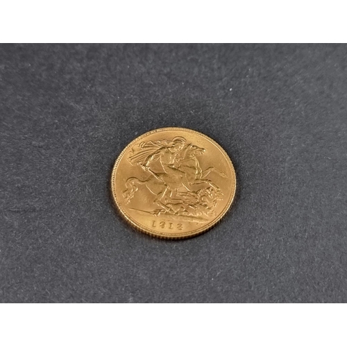 849 - Coins: a George V 1913 gold half sovereign.