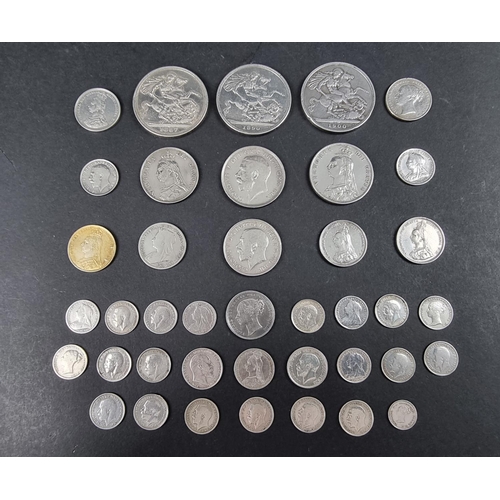 866 - Coins: a quantity of Victoria and George V silver coinage, to include: three Victorian crowns, 211g.... 