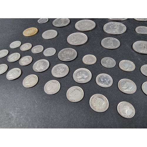 866 - Coins: a quantity of Victoria and George V silver coinage, to include: three Victorian crowns, 211g.... 