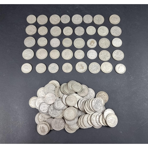 869 - A quantity of George V and George VI silver coinage, mostly .500, approximately 1720g.... 