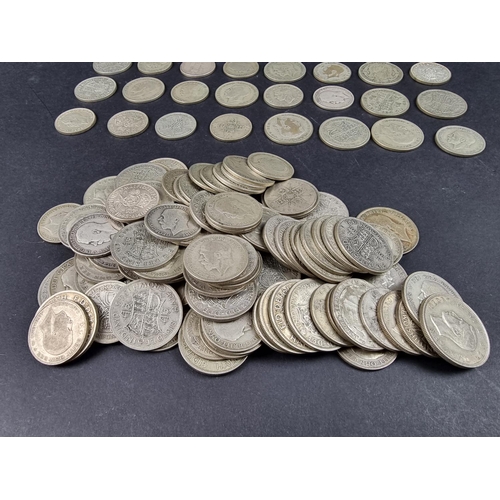 869 - A quantity of George V and George VI silver coinage, mostly .500, approximately 1720g.... 