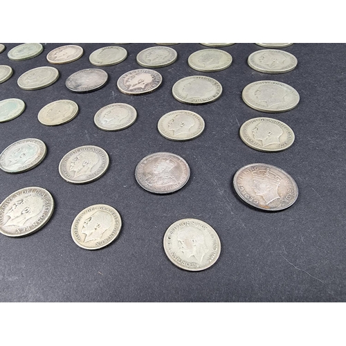 870 - Coins: a quantity of George V and George VI silver coinage, mostly post-1920 .500 standard, 393g; to... 