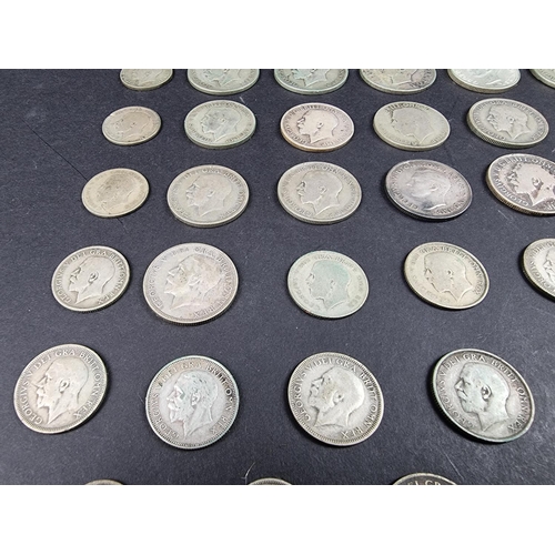 870 - Coins: a quantity of George V and George VI silver coinage, mostly post-1920 .500 standard, 393g; to... 