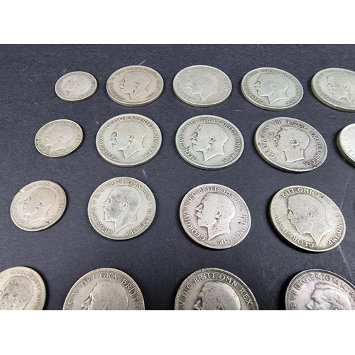 870 - Coins: a quantity of George V and George VI silver coinage, mostly post-1920 .500 standard, 393g; to... 