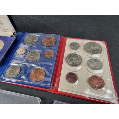 876 - Coins: mostly Queen Elizabeth II, to include three five pound coins.