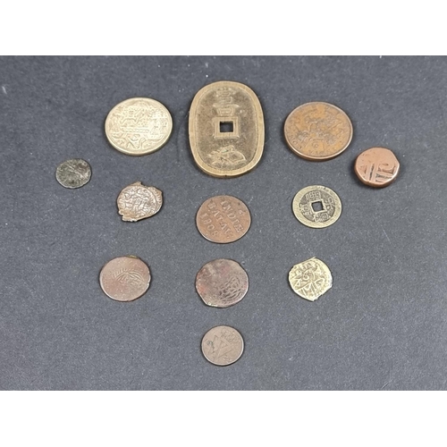 892 - Coins: an 1834 British East India, Bombay Presidency, 1/2 Anna coin; together with an Indian Ram Dar... 