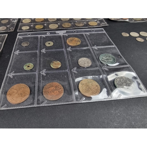 897 - Coins: a quantity of UK and world coins, to include some silver and part silver examples.... 