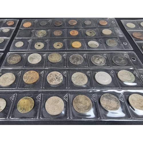 897 - Coins: a quantity of UK and world coins, to include some silver and part silver examples.... 