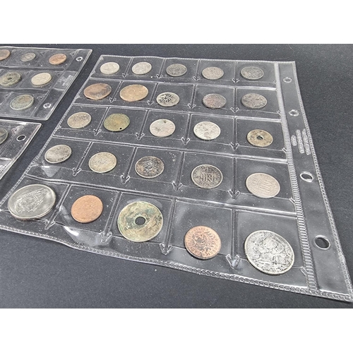 897 - Coins: a quantity of UK and world coins, to include some silver and part silver examples.... 