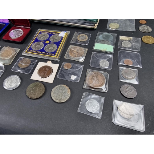 899 - Coins: an interesting collection of coins, in four albums and loose, mostly 19th and 20th century Ca... 