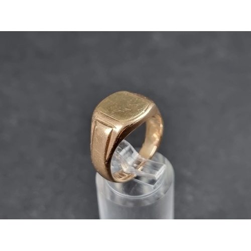 909 - A 9ct gold signet ring, London 1962, size N 1/2, 8.8g.