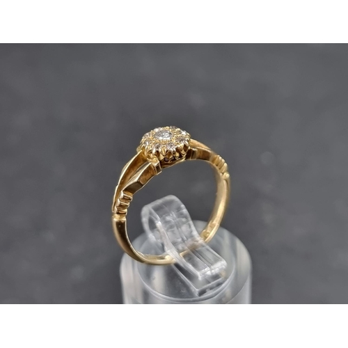 912 - An Edwardian 18ct gold diamond cluster ring, set nine old cut diamonds, Sheffield 1909, size M, gros... 