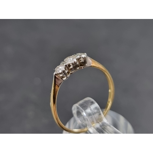 913 - A yellow metal diamond three stone ring, size O; together with a diamond five stone ring stamped 18c... 