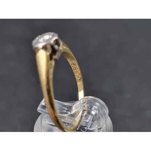 916 - A yellow metal diamond solitaire ring, stamped '18ct/plat', size N.