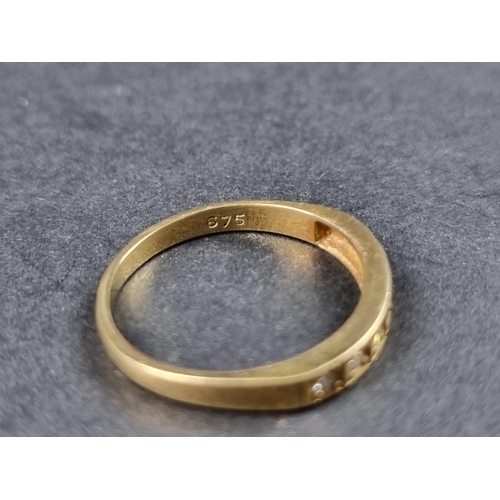 917 - An 18ct gold half eternity ring, set seven small brilliant cut diamonds, size O, gross weight 2.3g.... 