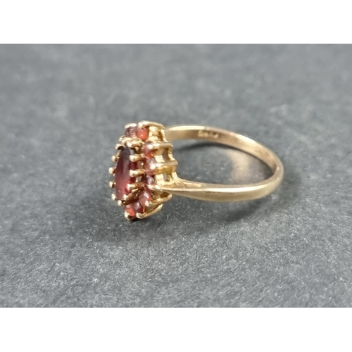 924 - A 9ct gold garnet cluster ring, size N 1/2; together with another 9ct gold garnet ring, size J 1/2, ... 