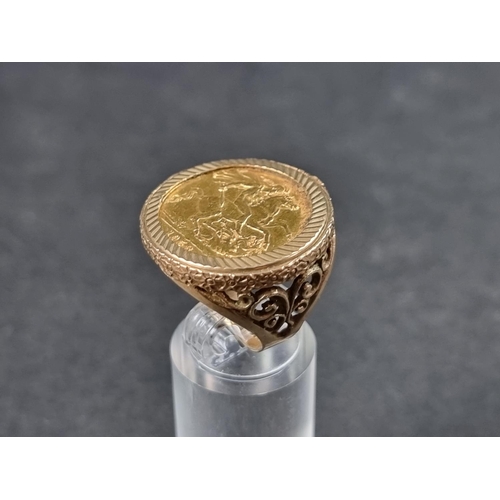 938 - A 9ct gold ring, set Elizabeth II 1958 gold sovereign, size P, gross weight 14.5g.