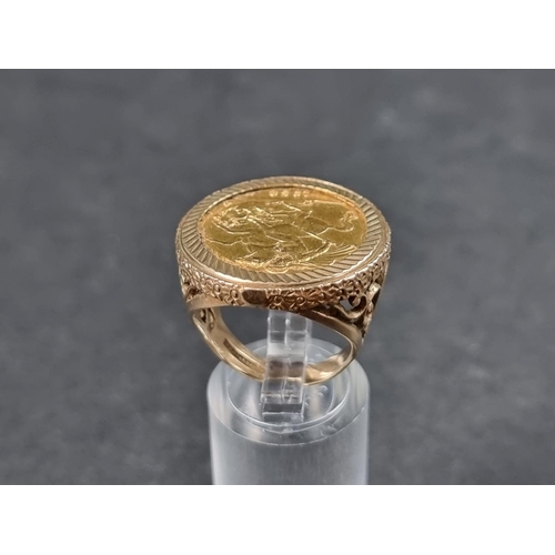 938 - A 9ct gold ring, set Elizabeth II 1958 gold sovereign, size P, gross weight 14.5g.