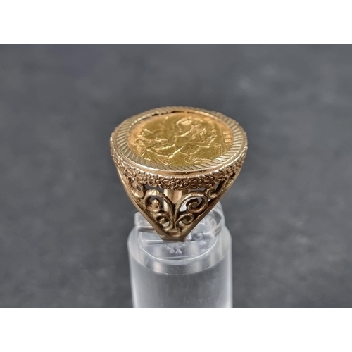 938 - A 9ct gold ring, set Elizabeth II 1958 gold sovereign, size P, gross weight 14.5g.