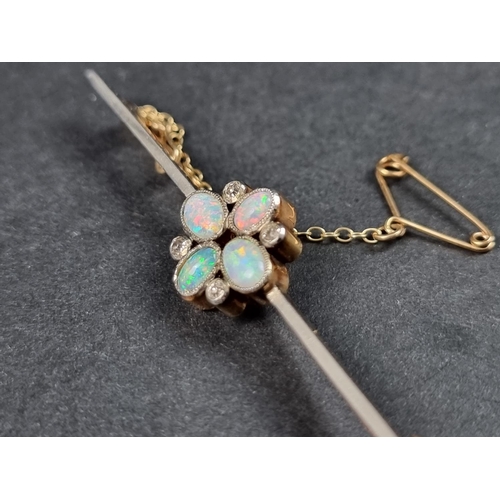 954 - A late Victorian yellow and white metal bar brooch, set central cluster of four cabochon opals and f... 