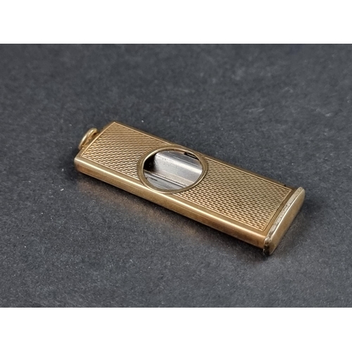 972 - A 9ct gold and steel cigar cutter, having engine turned decoration, by W.M Ltd, Birmingham 1967, 53m... 