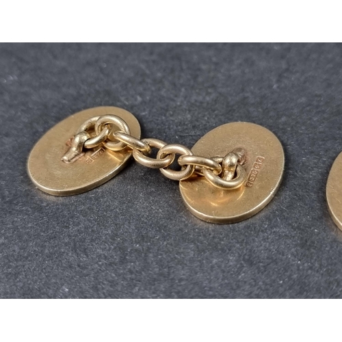 980 - A pair of 9ct gold cufflinks, Birmingham 1960, 19mm long, 14.9g.