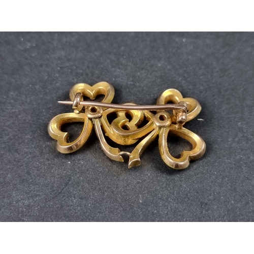 997 - A yellow metal diamond set and guilloche enamel brooch, formed as conjoined love heart ribbons, 33mm... 