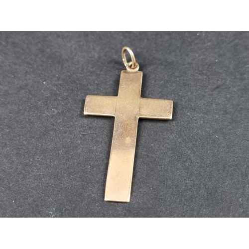 999 - A yellow metal cross pendant, 42mm high.