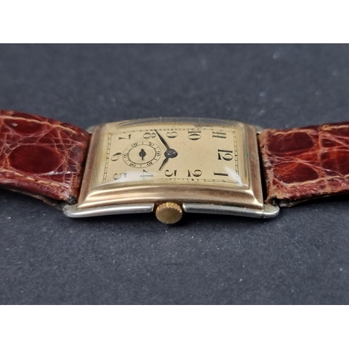 1155 - A Swiss Art Deco two tone 9ct gold manual wind wristwatch, 24 X 31mm, the movement stamped 63, on re... 