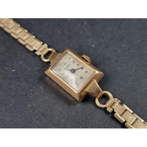 1163 - A vintage Cyma yellow metal manual wind ladies wristwatch, stamped '18k', 18mm x 14mm, on a rolled g... 