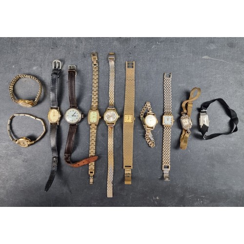 1180 - A quantity of ladies wristwatches; to include a silver watch; and examples by Seiko and Rotary. (11)... 