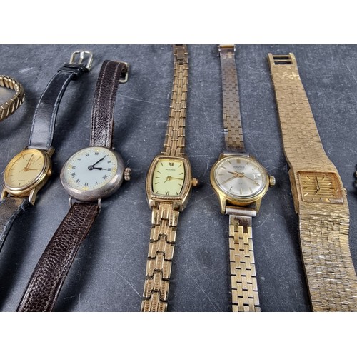 1180 - A quantity of ladies wristwatches; to include a silver watch; and examples by Seiko and Rotary. (11)... 