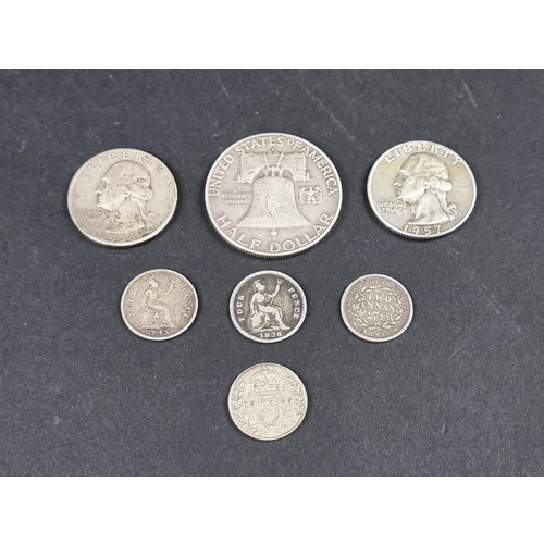 868 - Coins: seven various UK and US silver coins.