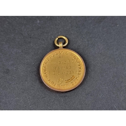 977 - A rare 9ct gold Nunhead FC football medal, circa 1926, inscribed 'Kings College Hospital Charity Cup... 