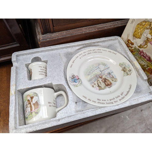 1369 - A collection of Beswick Beatrix Potter and Royal Doulton Winnie-the-Poo items, most boxed. ... 