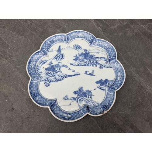 1577 - A Chinese blue and white dish, four character mark to base, painted with dragons, 34.5cm wide; ... 