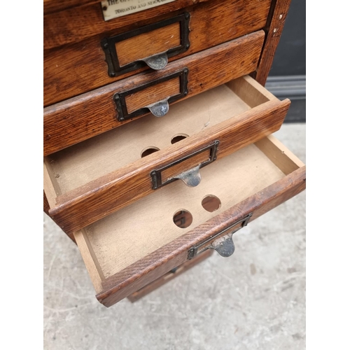 1000 - A small 1920s oak filing chest, labelled 'The Office Speciality MFG Co, Toronto...', 79.5cm hig... 