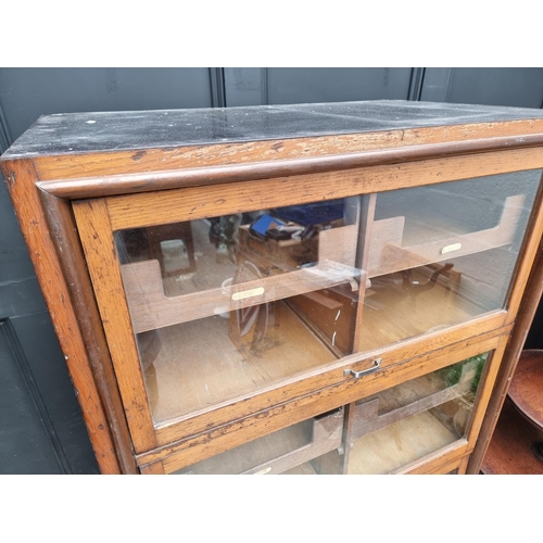 1002 - A vintage oak haberdashery cabinet, 168.5cm high x 87cm wide x 55cm deep.