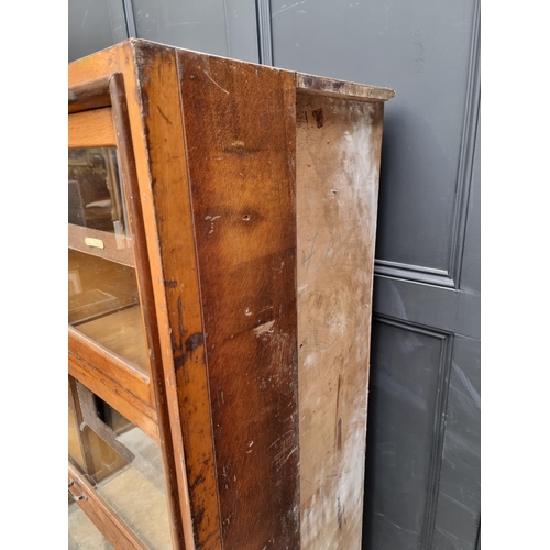 1002 - A vintage oak haberdashery cabinet, 168.5cm high x 87cm wide x 55cm deep.