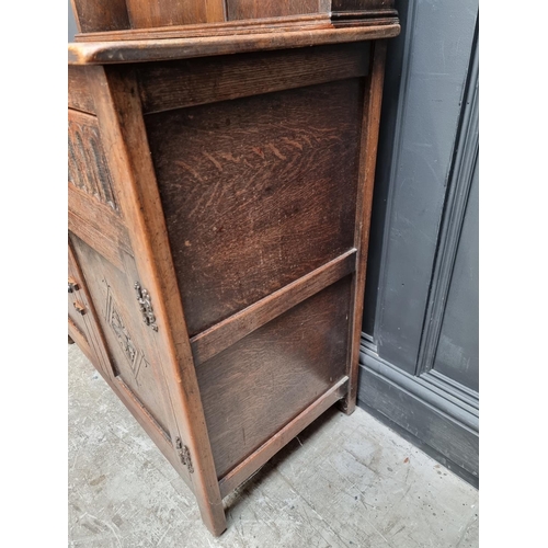 1004 - A small reproduction oak dresser and dome top rack, 91.5cm wide. 