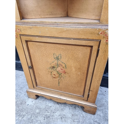 1005 - An 18th century style gilt painted standing corner cupboard, 69cm wide. 