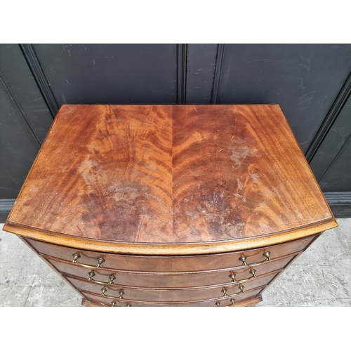 1008 - A reproduction mahogany bowfront chest of drawers, 79cm wide. 