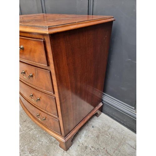 1008 - A reproduction mahogany bowfront chest of drawers, 79cm wide. 